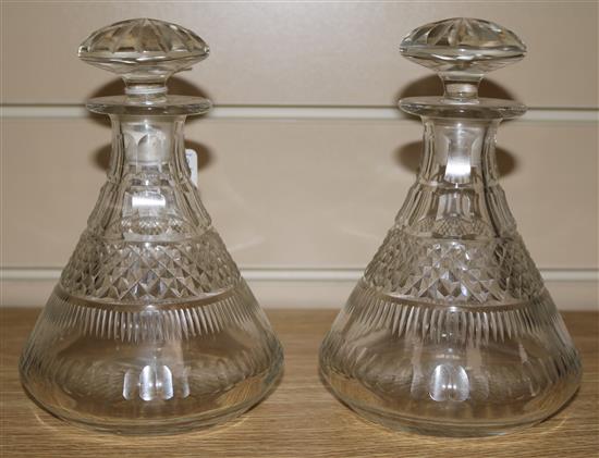 A pair of small Georgian hobnail cut decanters